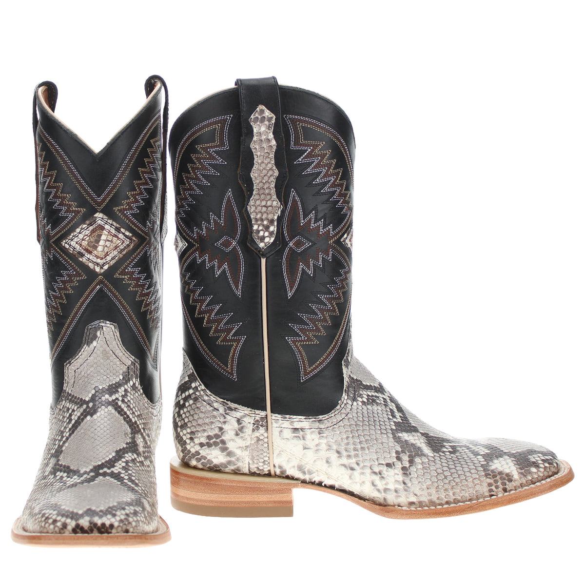 Pair of western cowboy boots with black shaft, chevron stitching, and light snakeskin panels