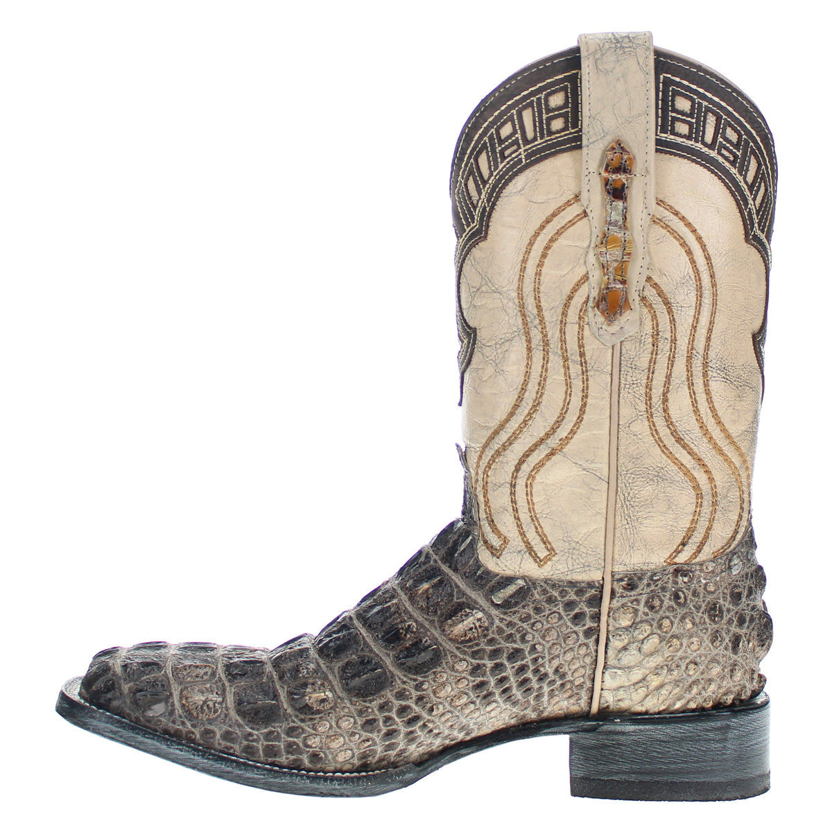 Western cowboy boot angled side view with tan shaft, dark cross stitching, and curved sole.