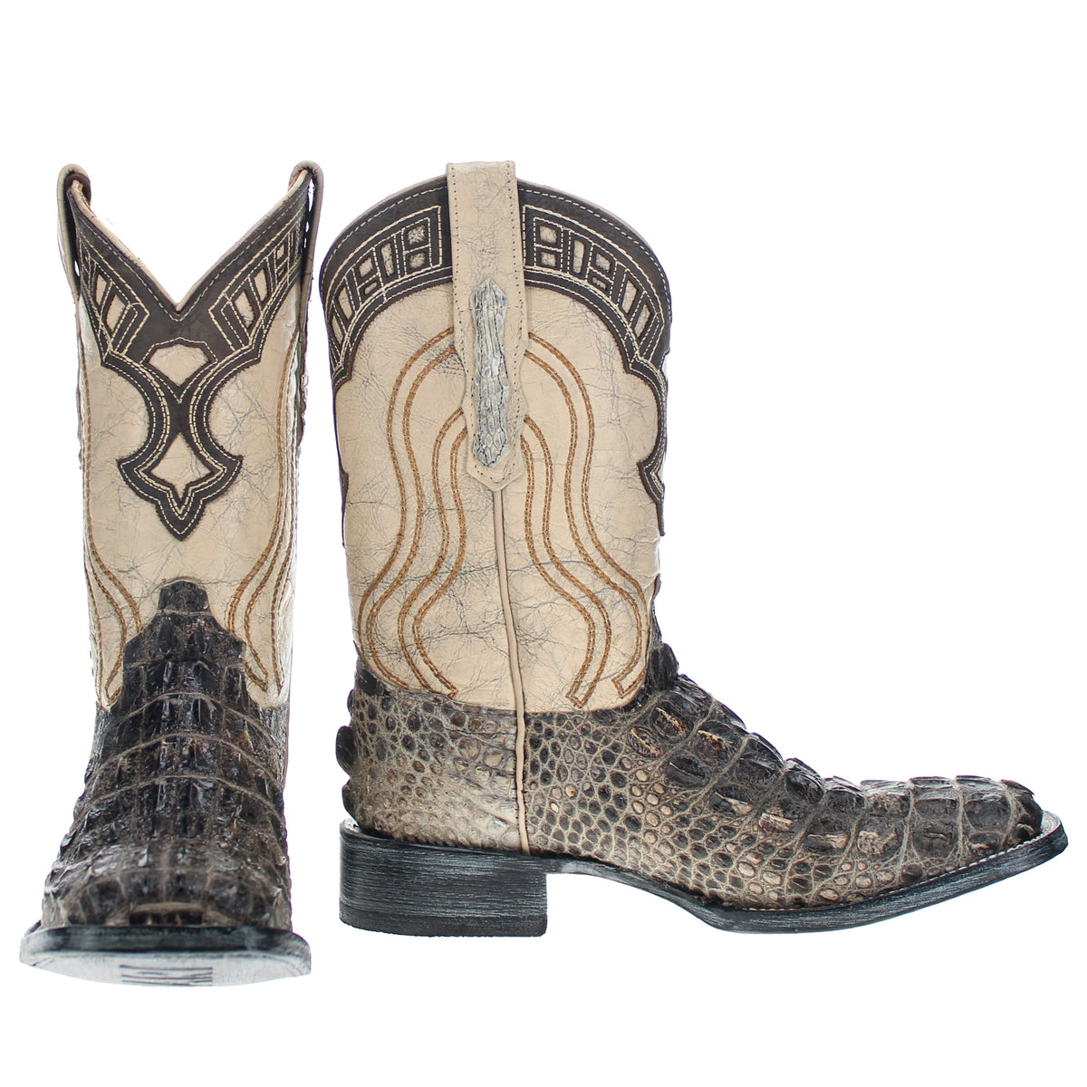 Pair of western cowboy boots: tan embroidered shafts with dark crocodile-embossed quarters.