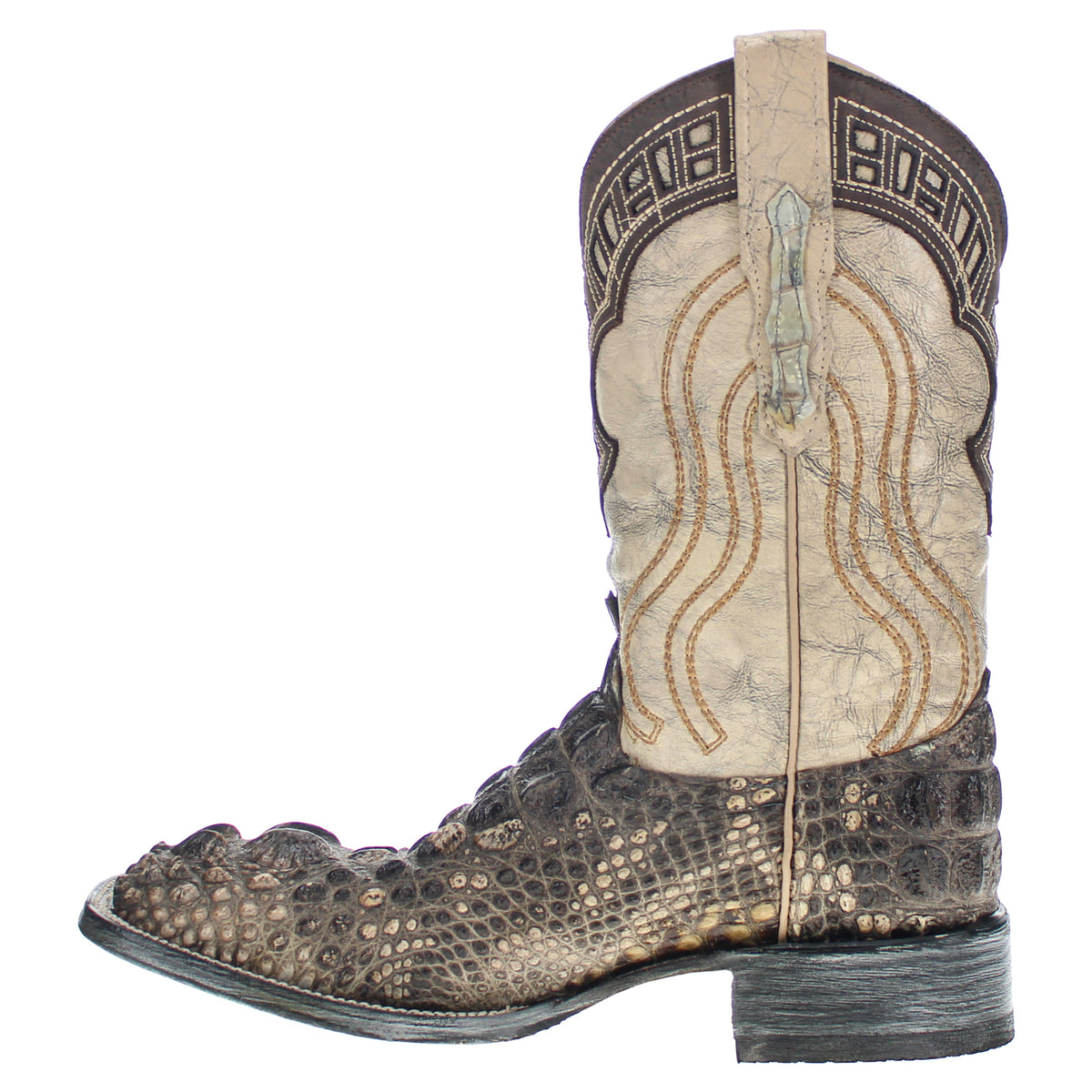 Western cowboy boots, tan shaft with black accents and ornate stitched patterns