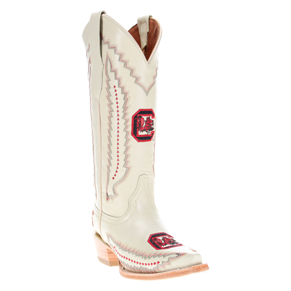 Side view of cream cowboy boot with red emblem patch and stitched western pattern