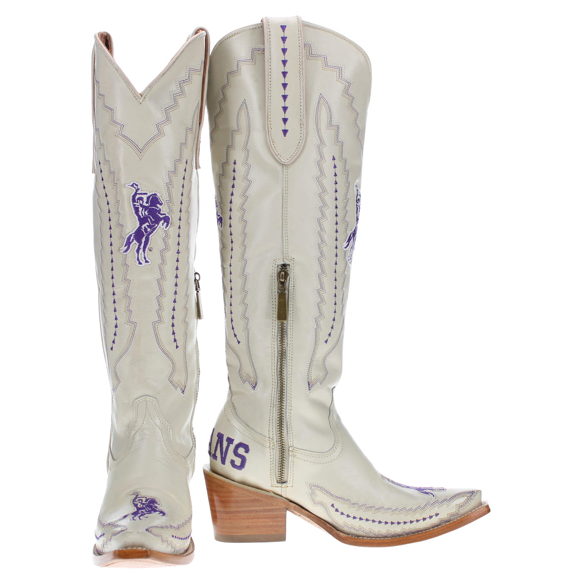 Cream cowboy boots with purple horse logo, stitched panels, and wood-look heel