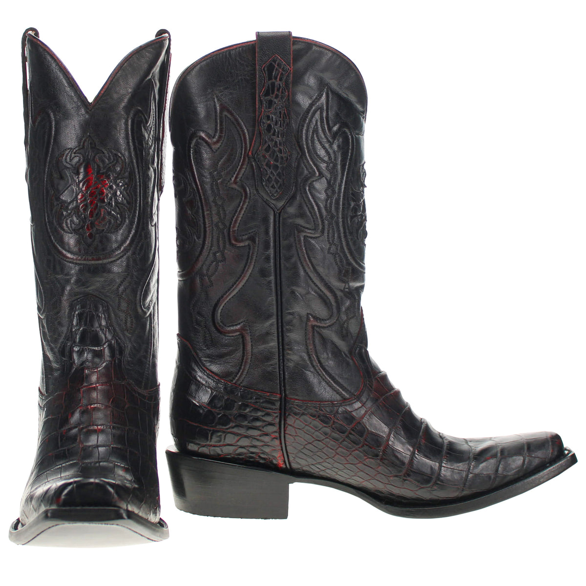 Black cowboy boots with pointed toe, western stitching, and red embroidered emblem