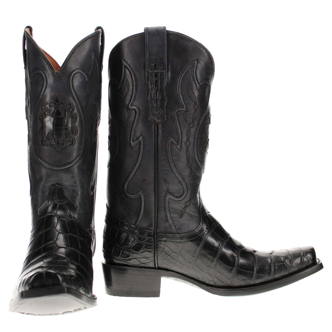 Pair of black alligator cowboy boots with caiman crocodile texture