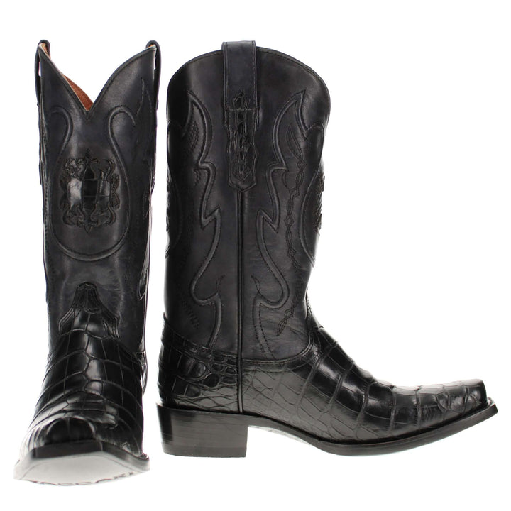 Pair of black alligator cowboy boots with caiman crocodile texture
