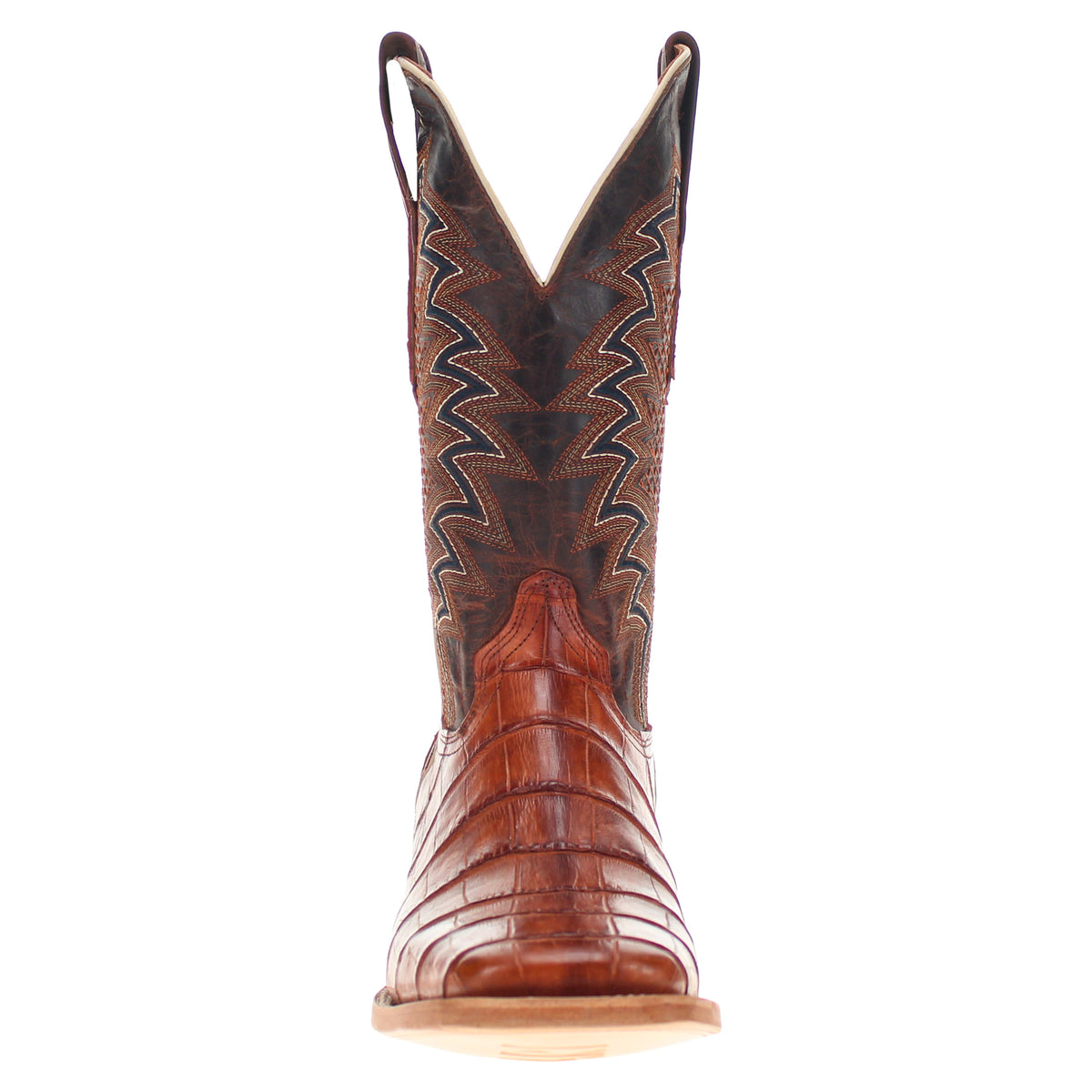 Brown western boot with detailed shaft embroidery, pointed toe and light tan outsole