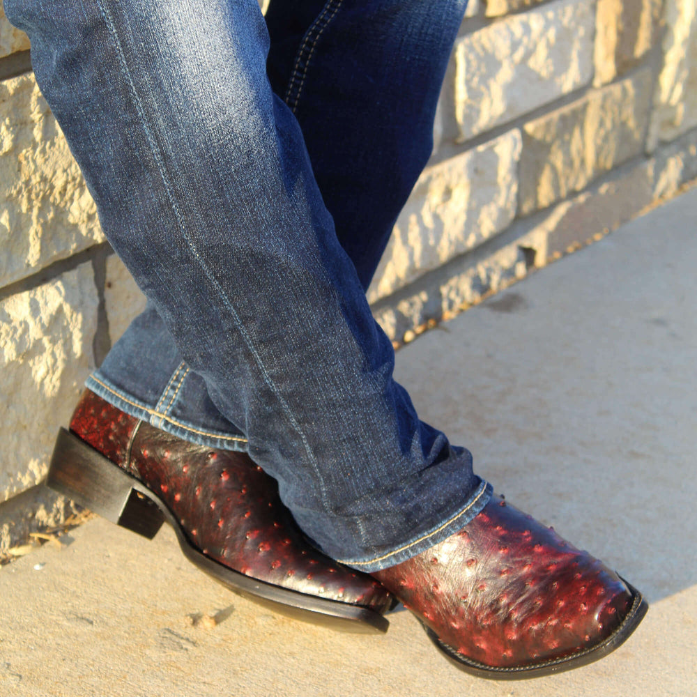 Mens black cherry leather western boots with narrow square toe and decorative stitching, featuring full-quill ostrich leather on the foot for added texture.