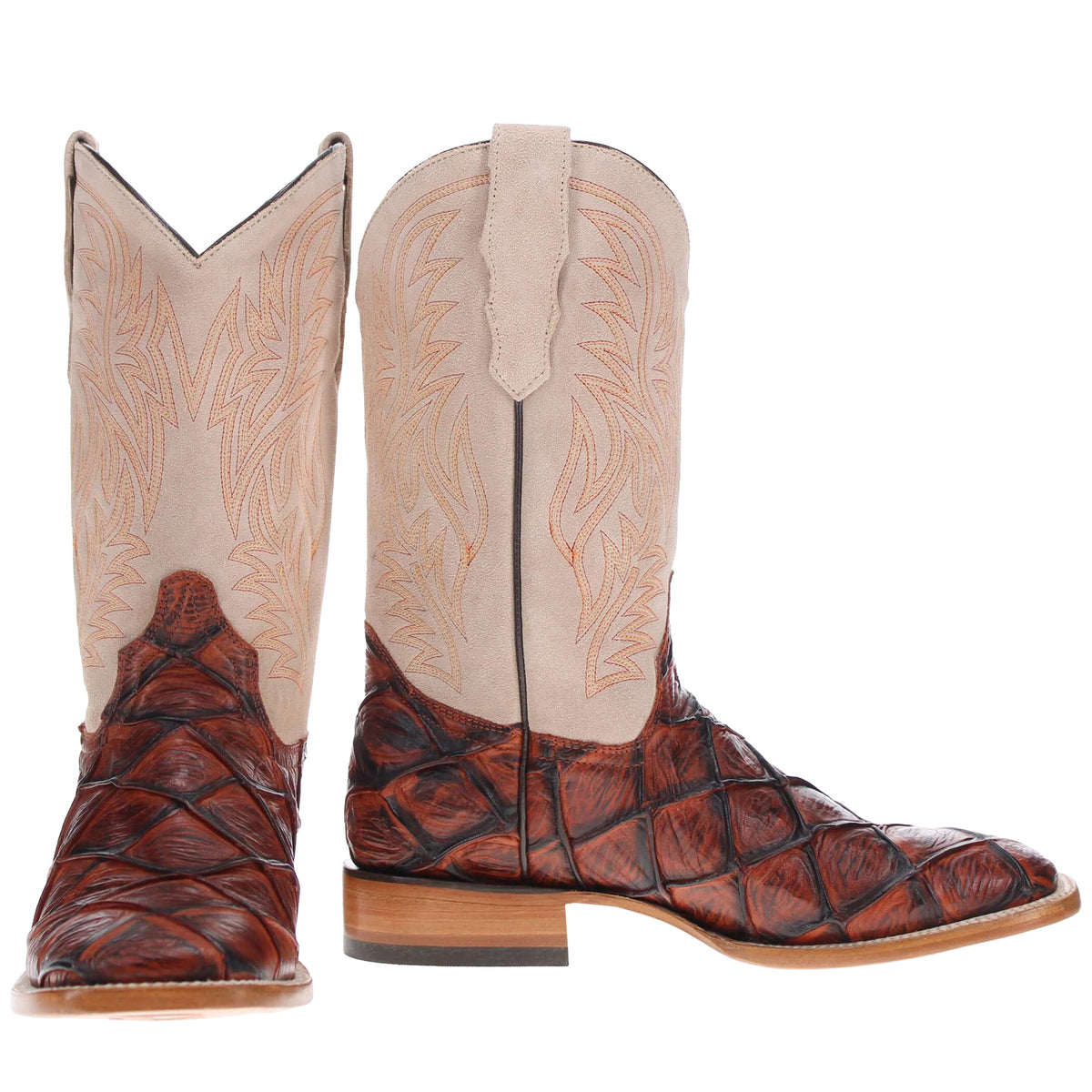 Pair of tan and brown cowboy boots shown together, with leaf pattern shafts