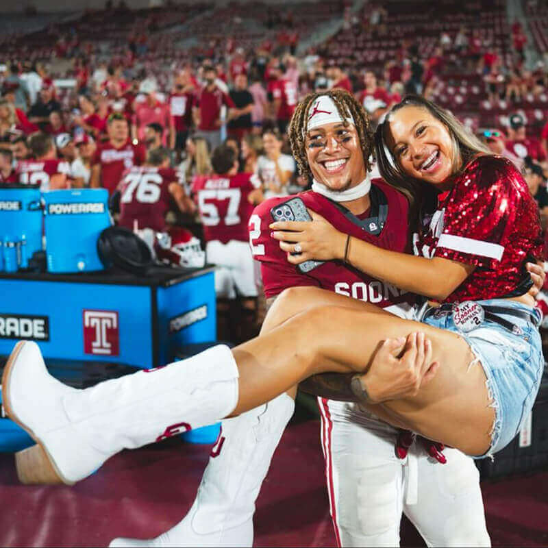 White cowgirl boots being worn on gameday