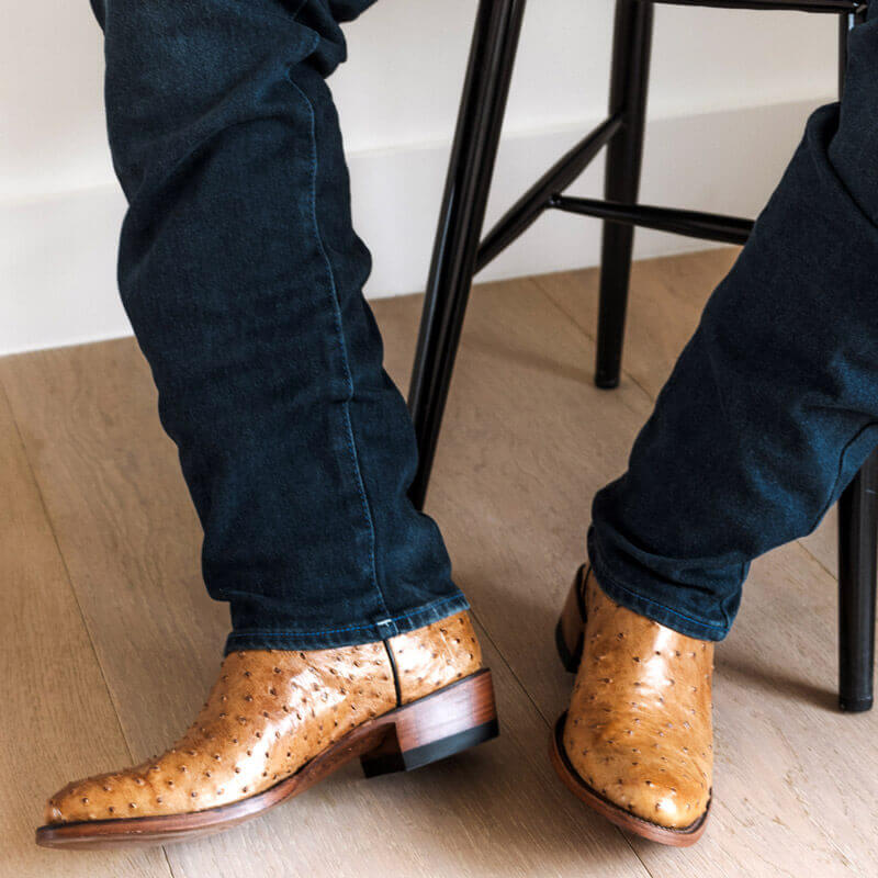 Men's exotic full quill ostrich saddle tan cowboy boots.