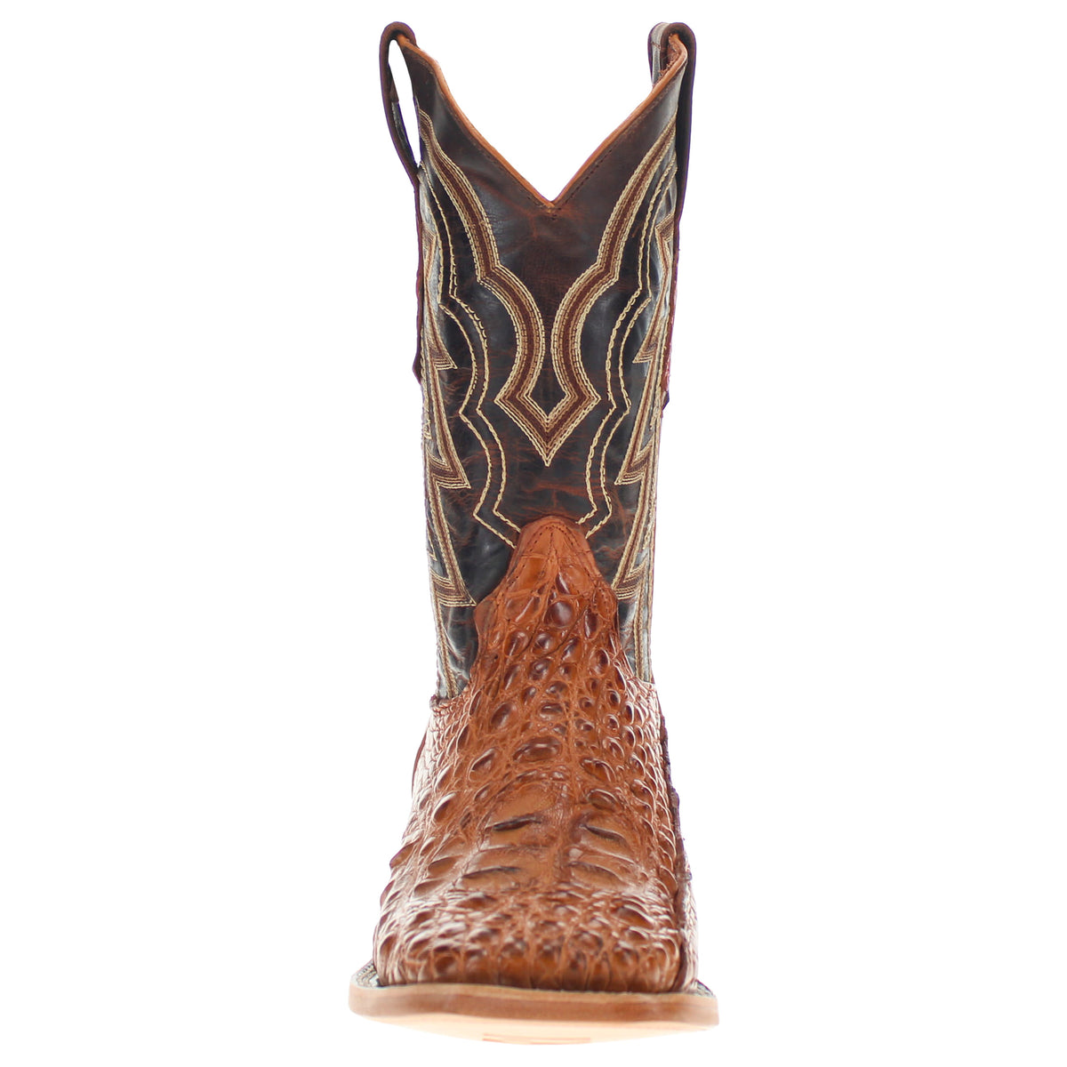 Brown leather cowboy boot side view with ornate stitch lines and textured shaft.