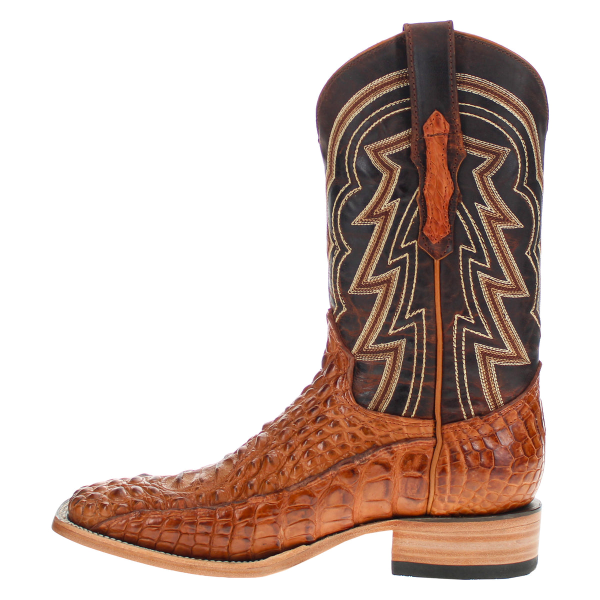 Brown and dark cowboy boot with vertical seam panel and crosshatch stitching.