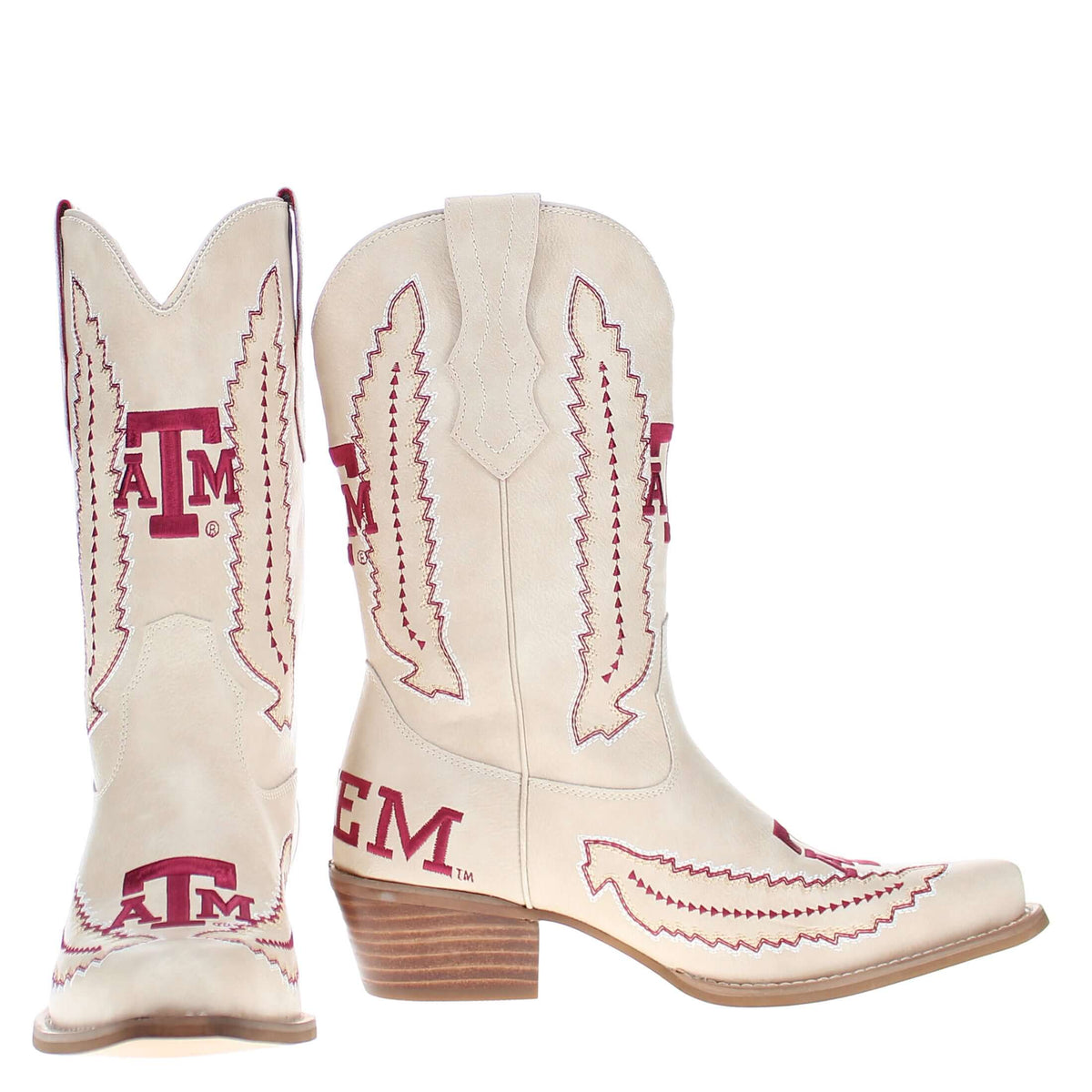 Pair of tan cowboy boots with maroon lightning embroidery, Texas A&M logos, low heel