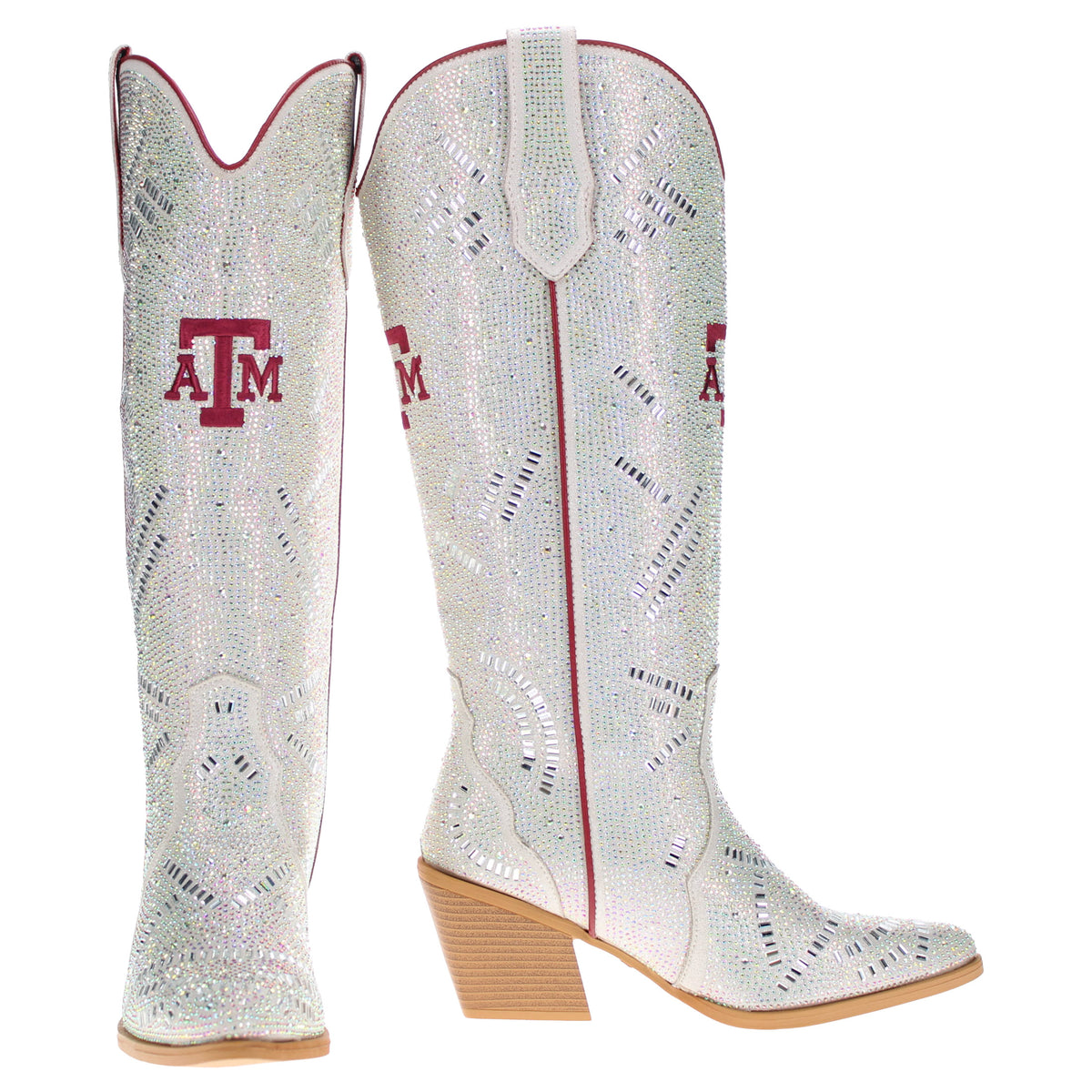 Pair of rhinestone cowboy boots with A&M emblem, red-trim pointed toes, tan heels.