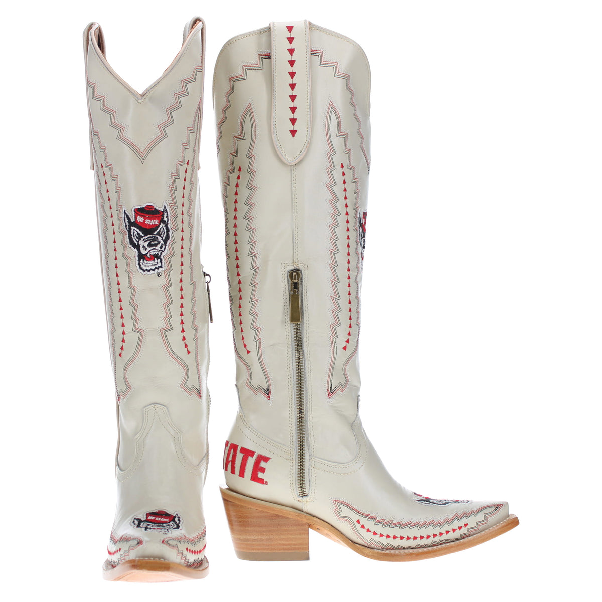 White cowboy boots with red/gray stitched yoke and dog logo patches, wood-look heels