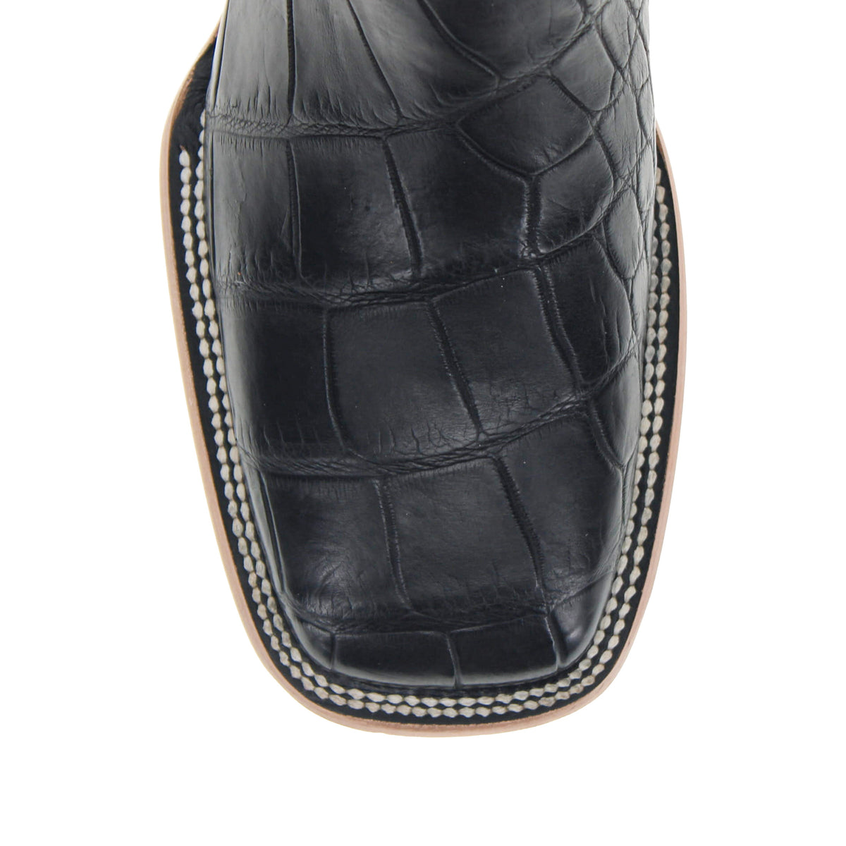 Black cowboy boots with crocodile-print leather and rope-look trim around the opening