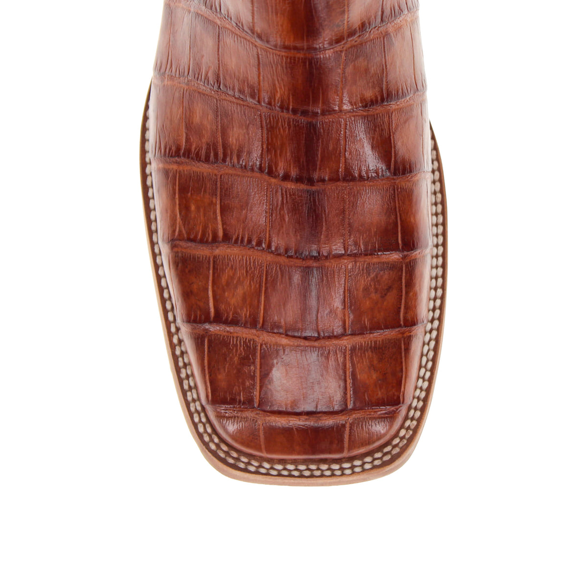 Crocodile-style brown boot foot with decorative stitched edge and tan welt