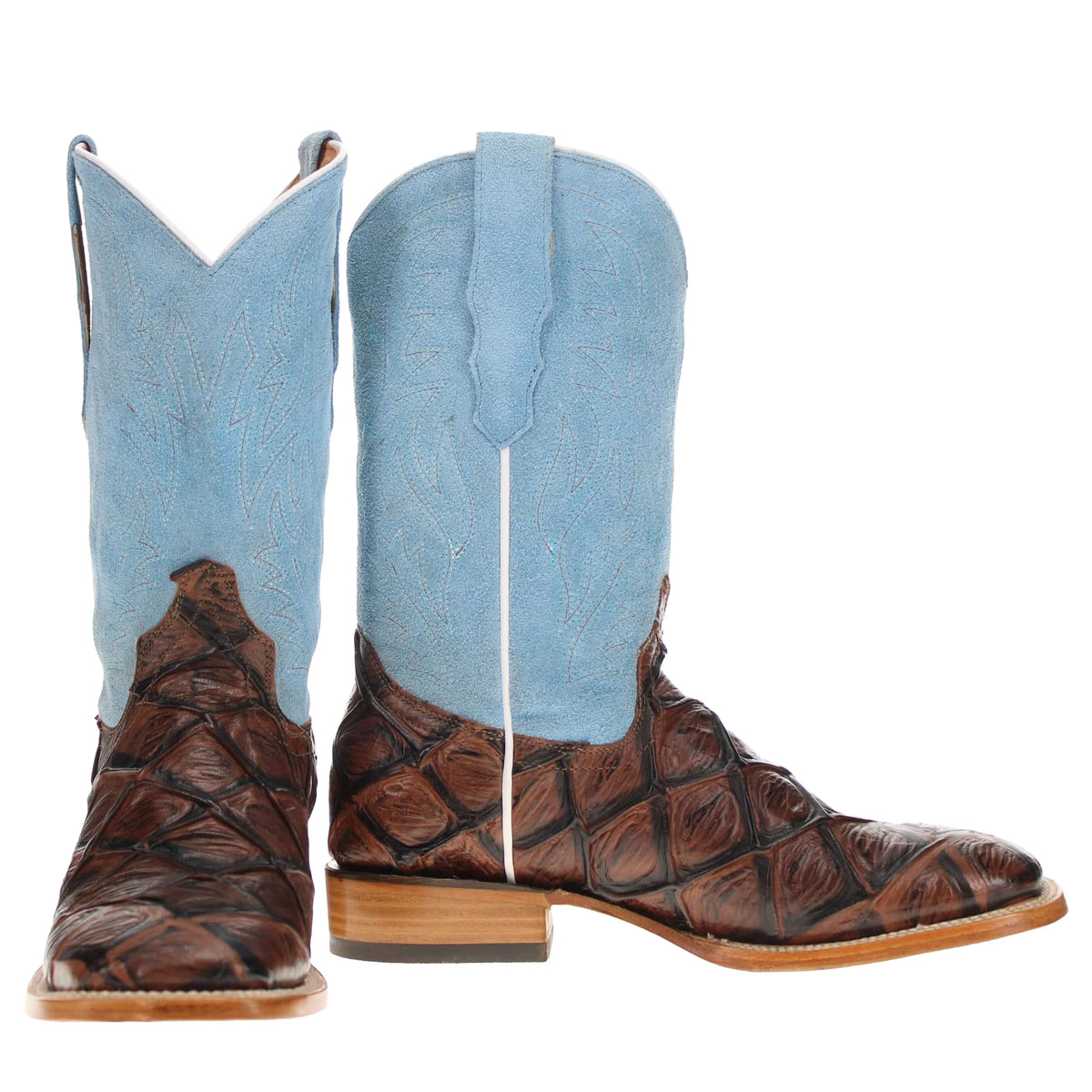 Western cowboy boots pair view: light blue shafts with brown patterned leather and tan soles.