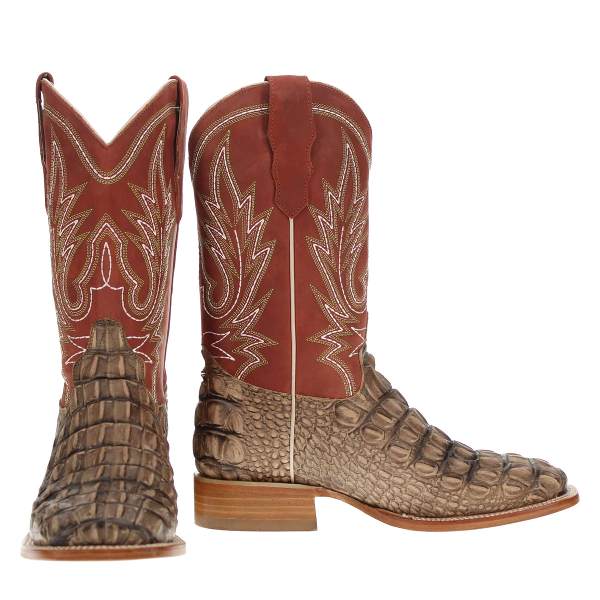 Pair of rust-red and tan western cowboy boots with ornate shaft embroidery and stacked heel