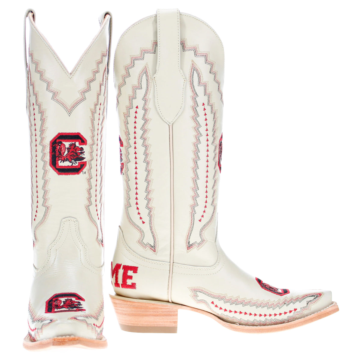 Two cream cowboy boots side-by-side with red emblems and stitched western details