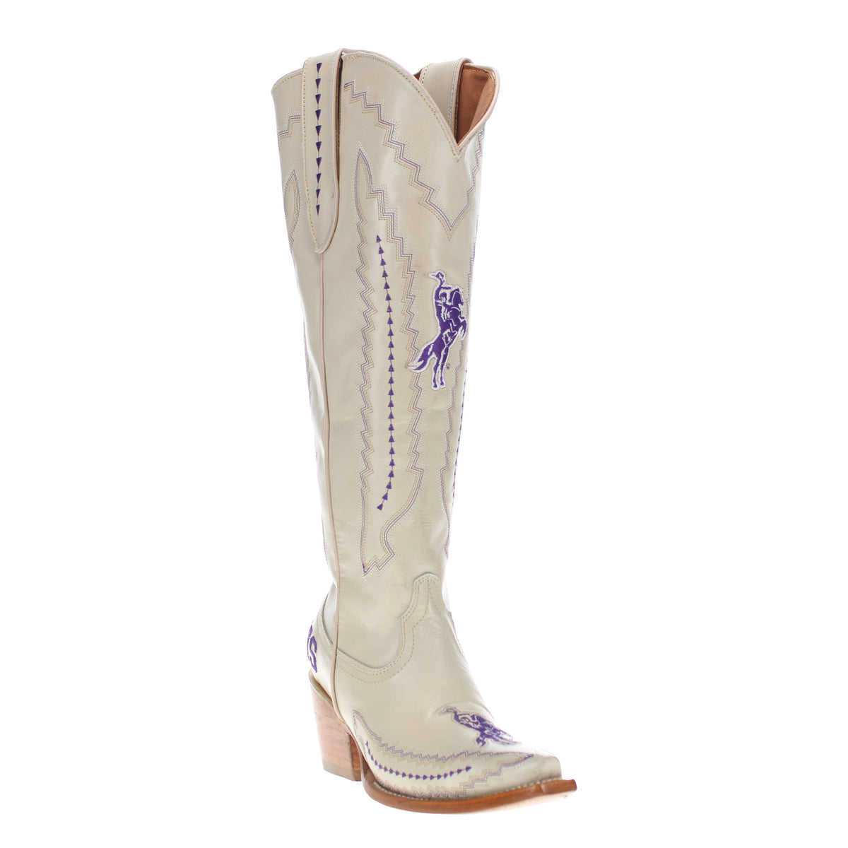 Cream tall cowboy boot with pointed toe, purple logo, and stacked wood-look heel
