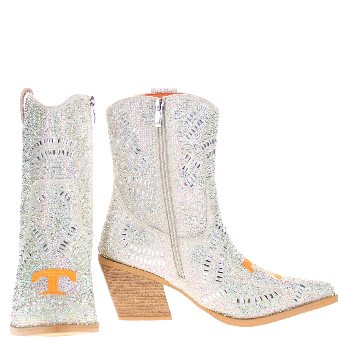 Pair of jeweled cowboy boots shown together, one side zipper visible and orange “T” logos.