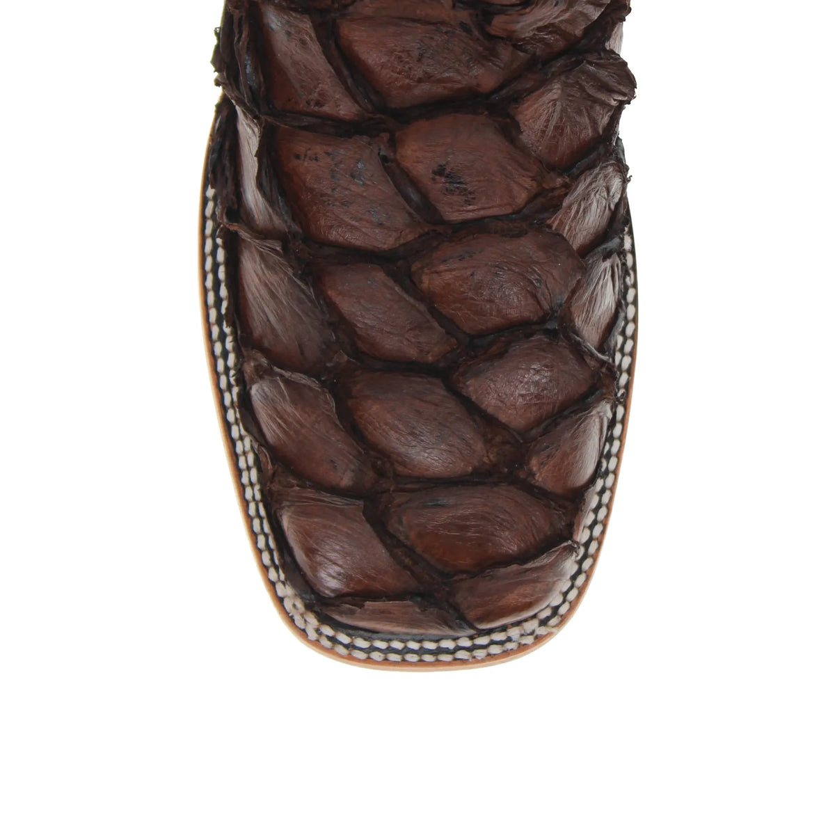 Brown leather boot vamp close-up with stitched panels and crinkled texture