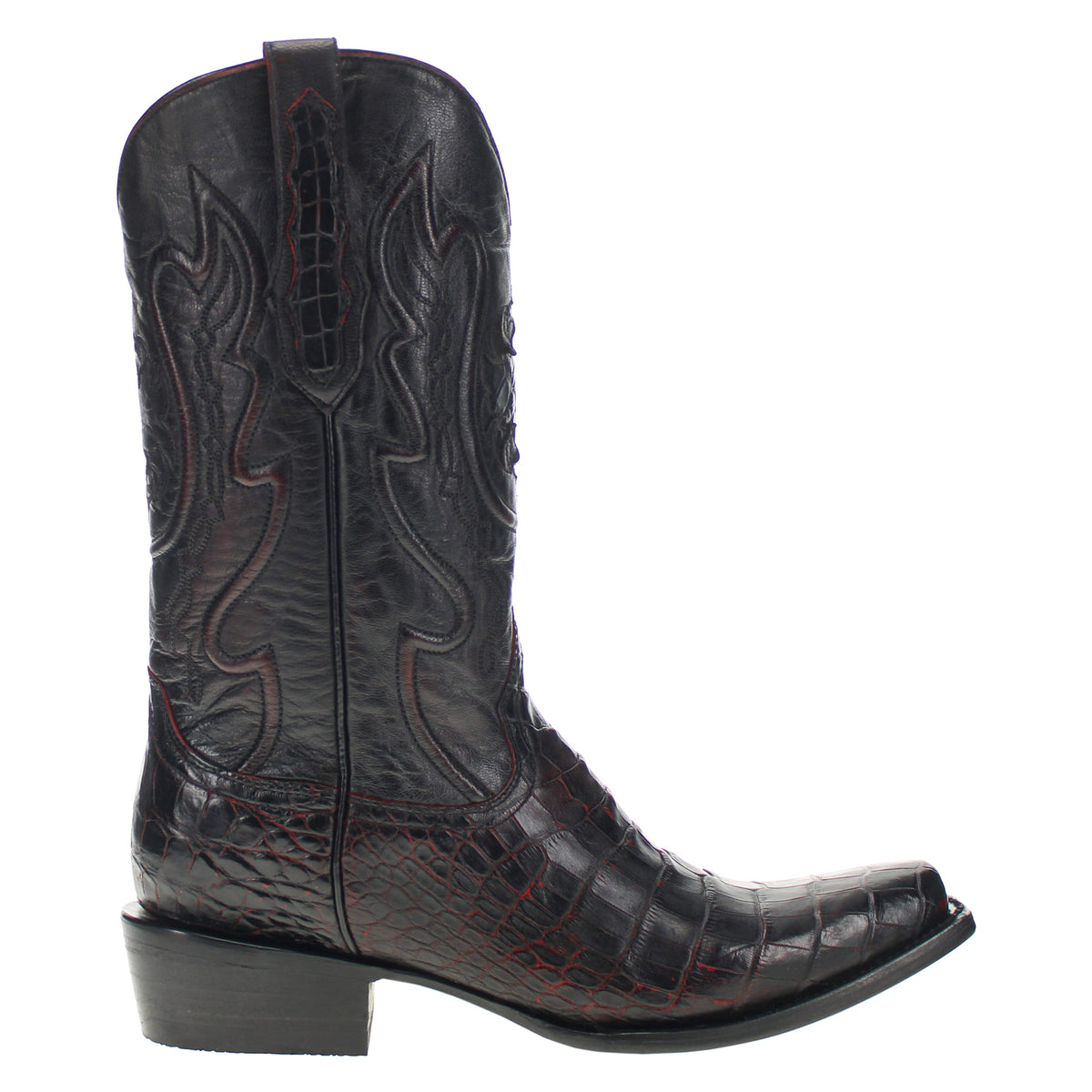 Black cowboy boot with pointed toe and stacked heel, ornate panel embossing