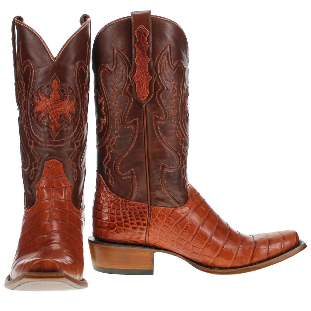 Pair of brown leather cowboy boots with western embroidery, pointed toe, stacked heels.