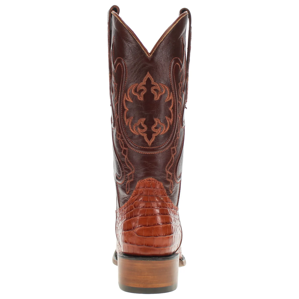Brown leather cowboy boot with ornate back embroidery and polished leather heel.