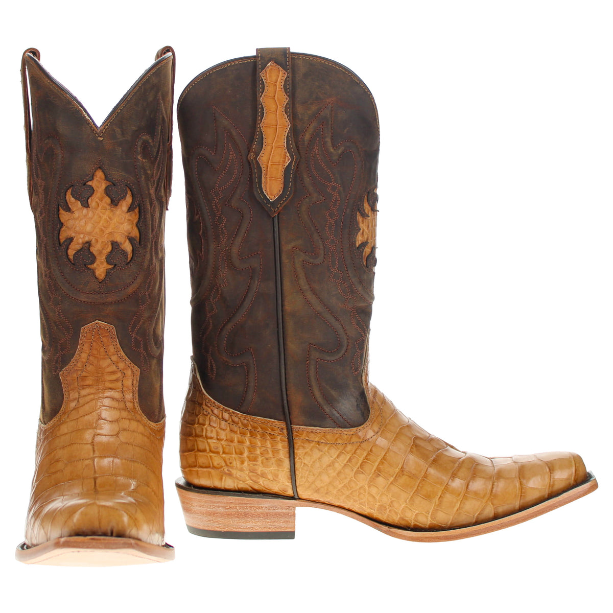 Pair of western cowboy boots with tan crocodile-print feet and dark brown shafts