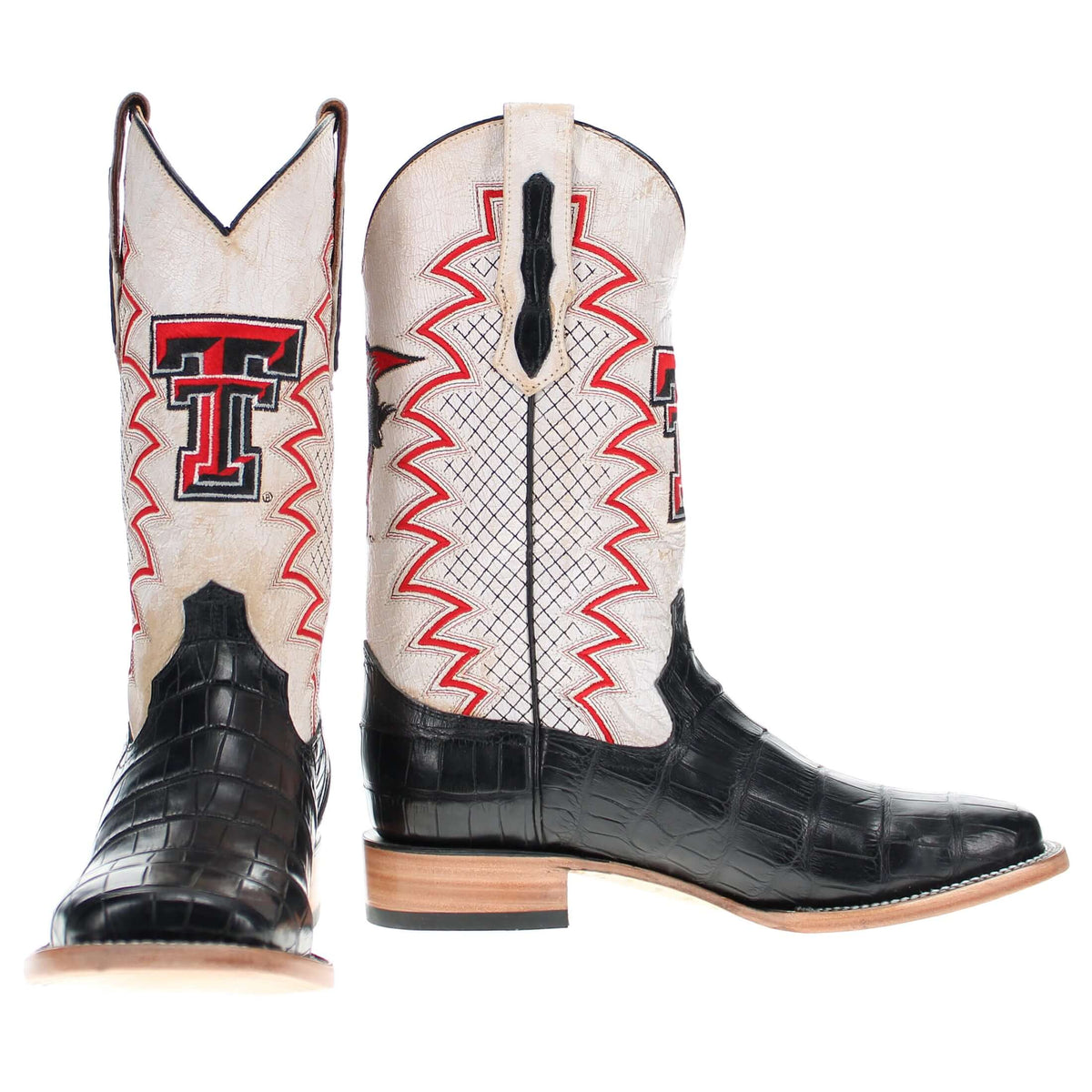 Pair of black and beige cowboy boots with red trim and T logo shafts