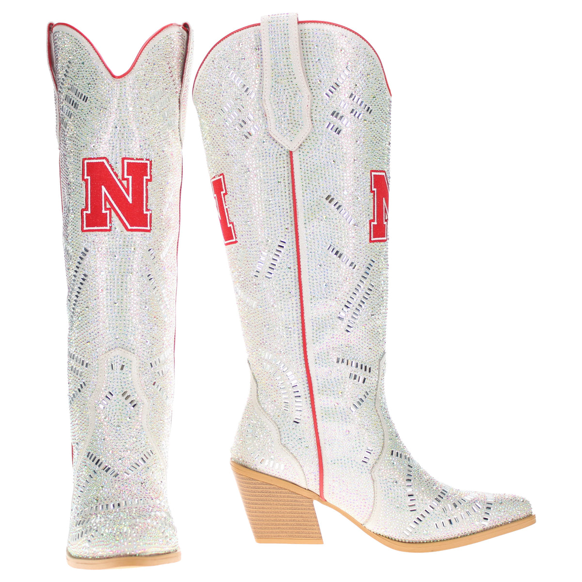Pair of tall white cowboy boots with red piping and N logos; tan block heels