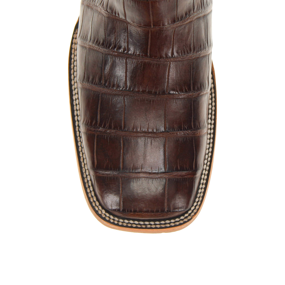 Navarro boot heel counter close-up with brown crocodile-textured leather and edge stitching