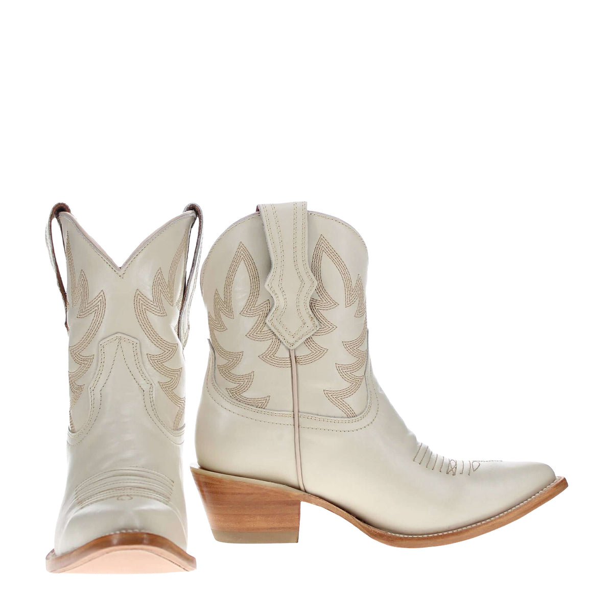 Cream cowboy boots with tan leaf embroidery and low stacked heel
