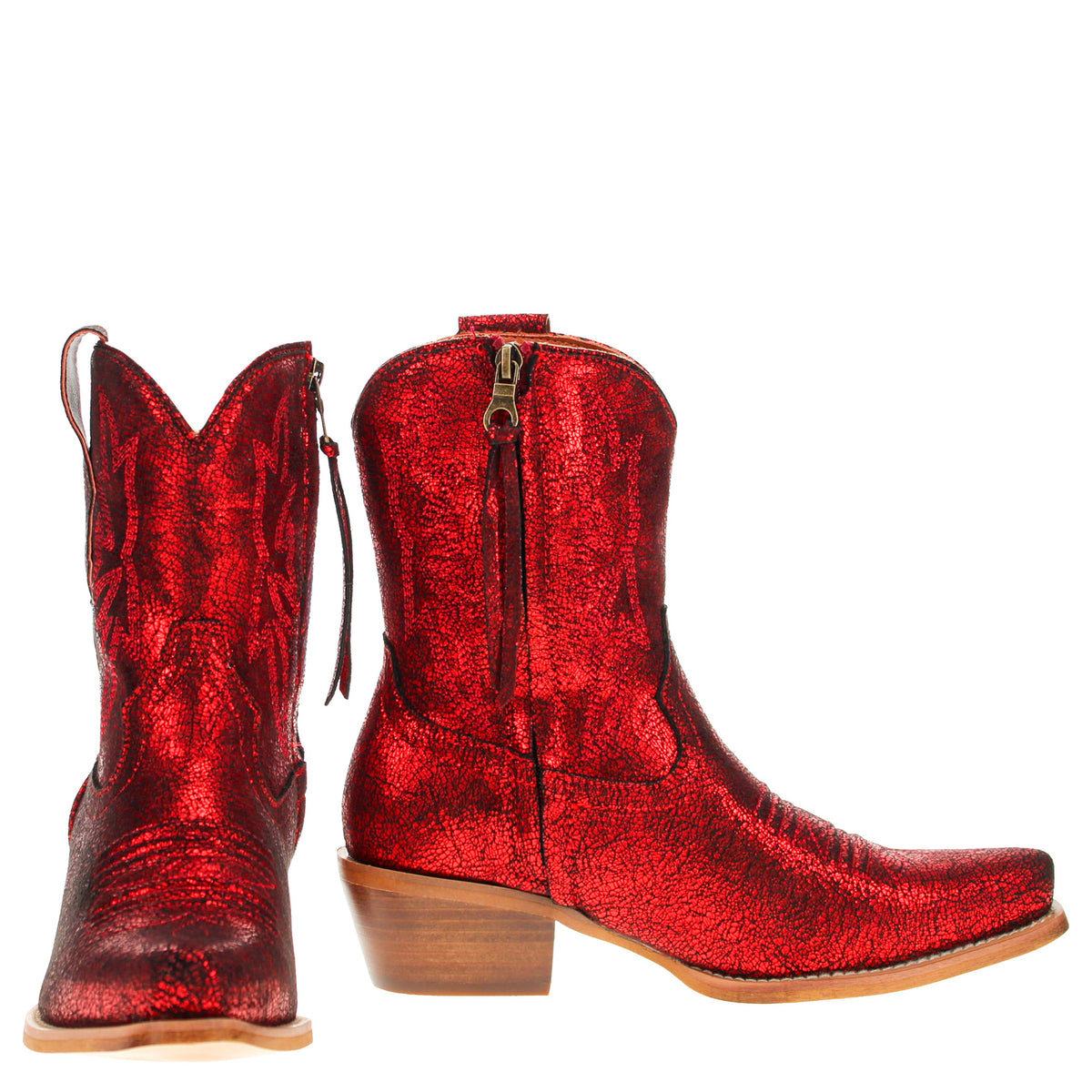 Pair of red cowboy boots with side zips and stacked mid heels