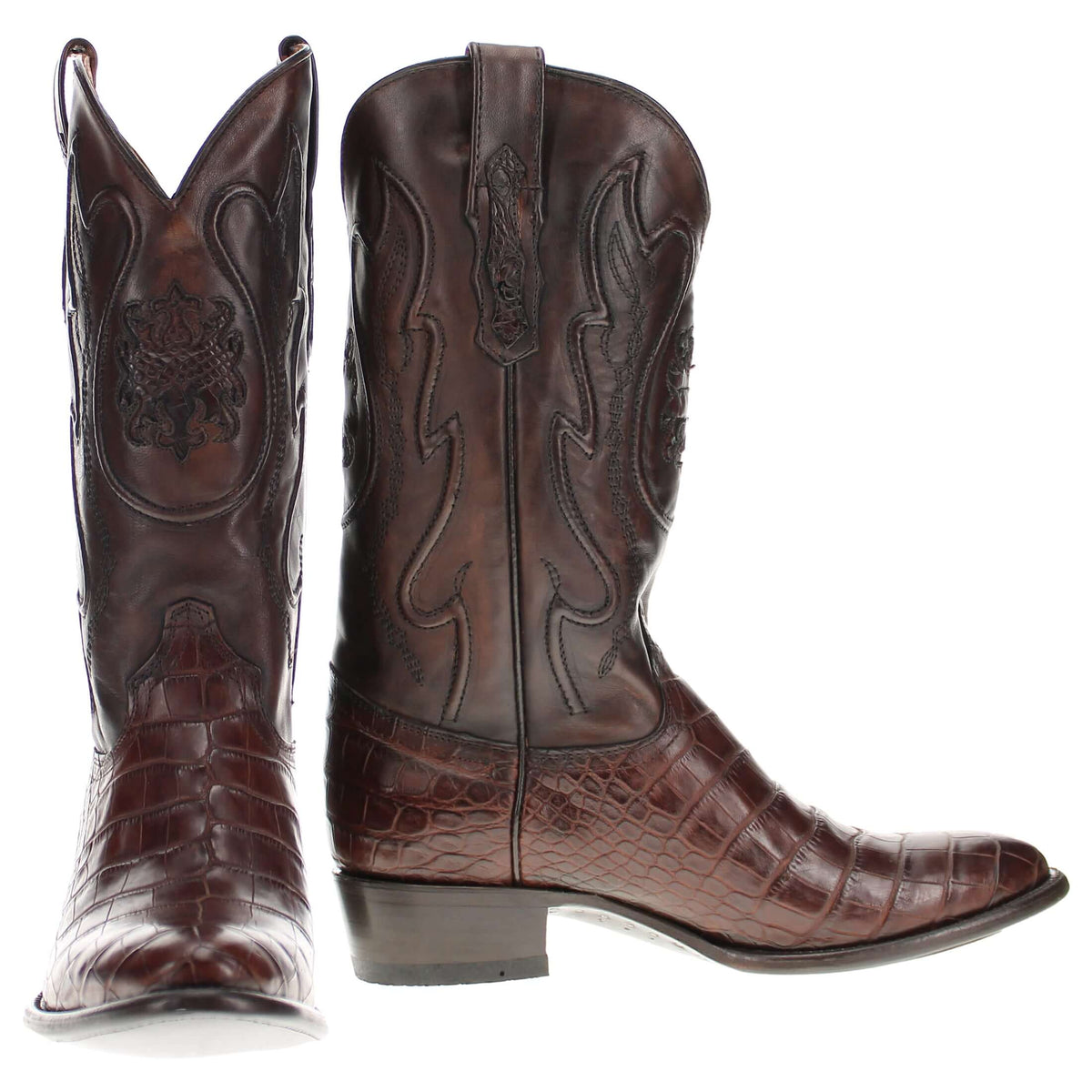 Pair of brown cowboy boots, high shafts with embossed crests and textured foot