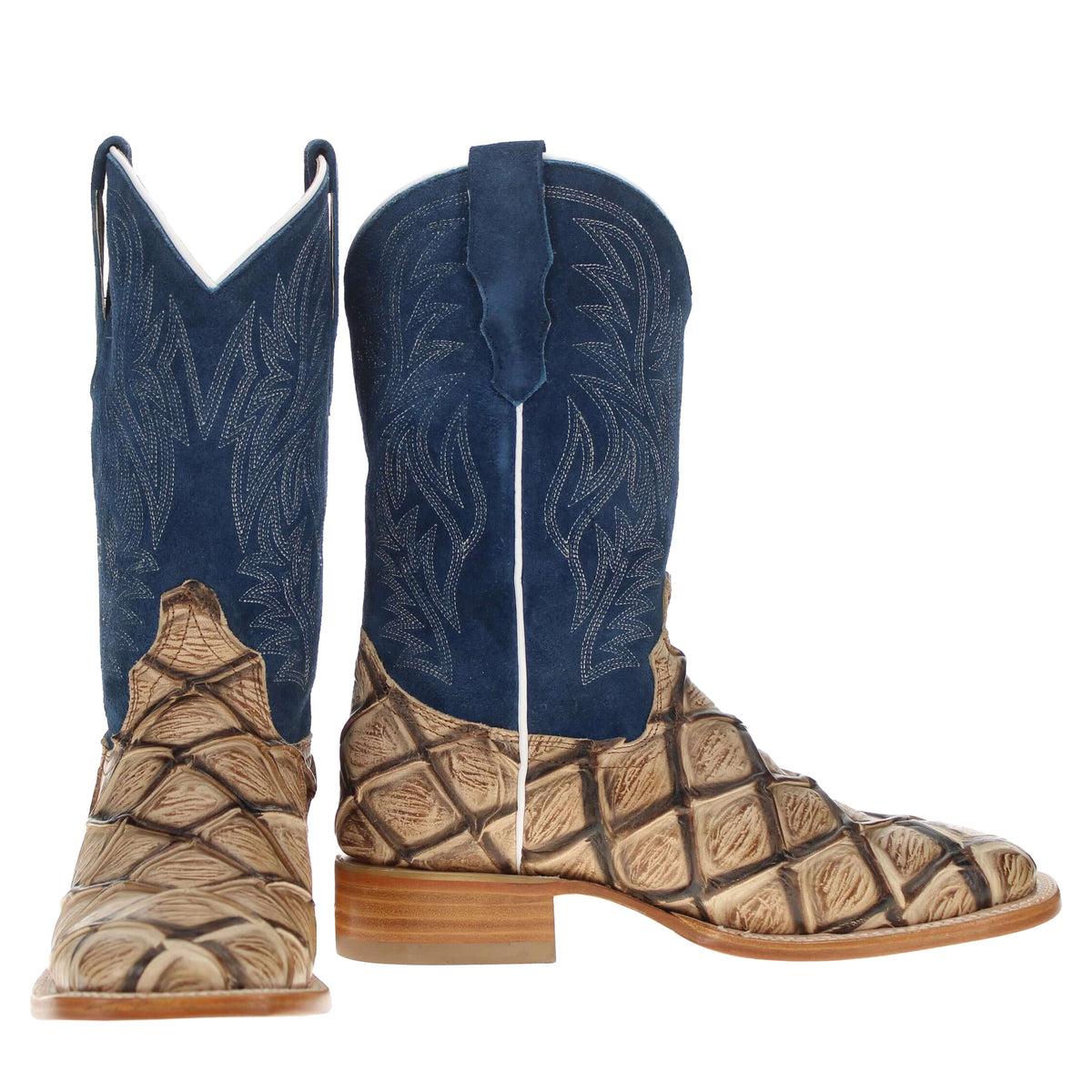 Pair of blue western cowboy boots with floral stitching and tan sculpted toe sections