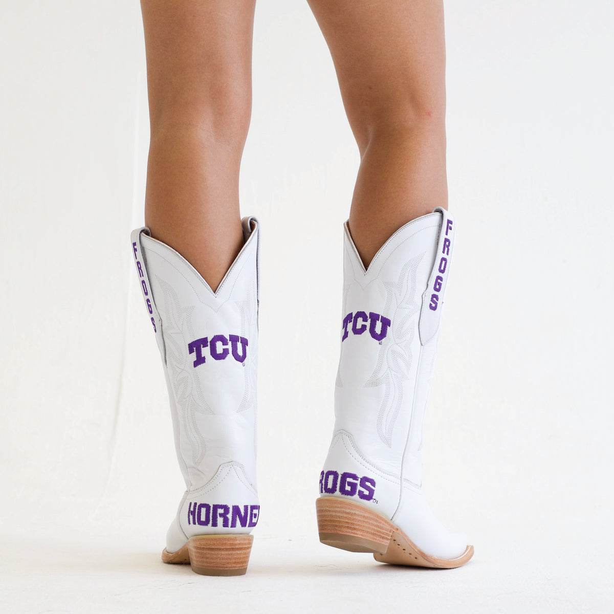 Lainey white cowboy boots with purple lettering