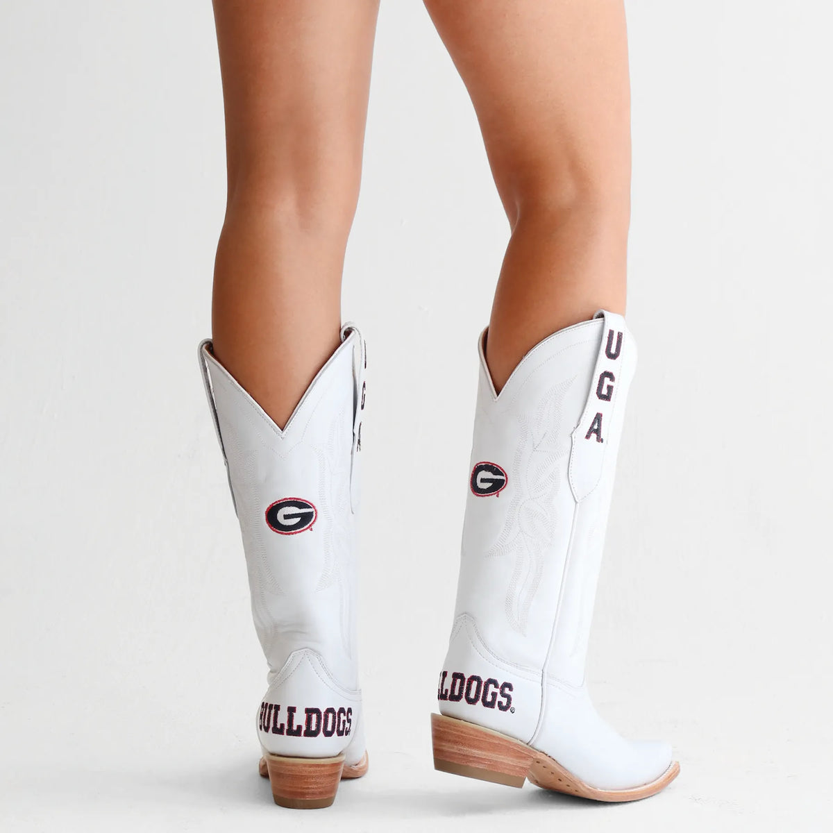 White cowboy boots with brown heel, side logo and pull tabs with UGA lettering