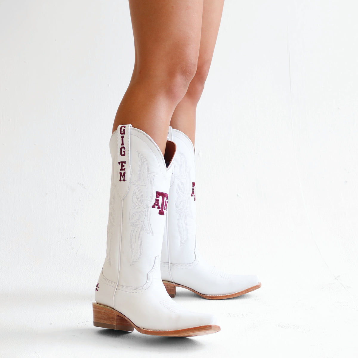 Lainey white cowboy boots with maroon side embroidery, tan outsole and heel