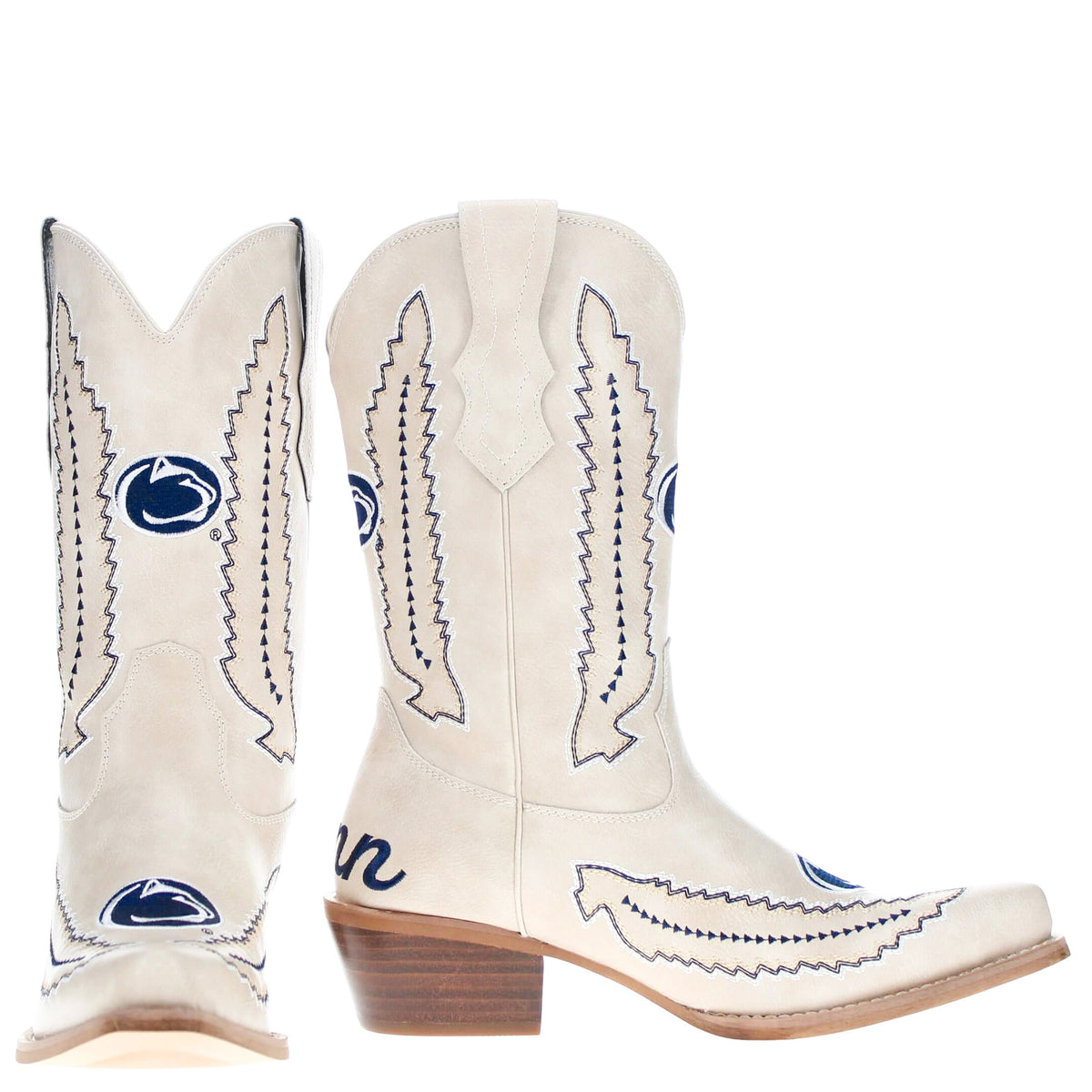 Pair of cream cowboy boots with blue embroidered designs and low stacked heel