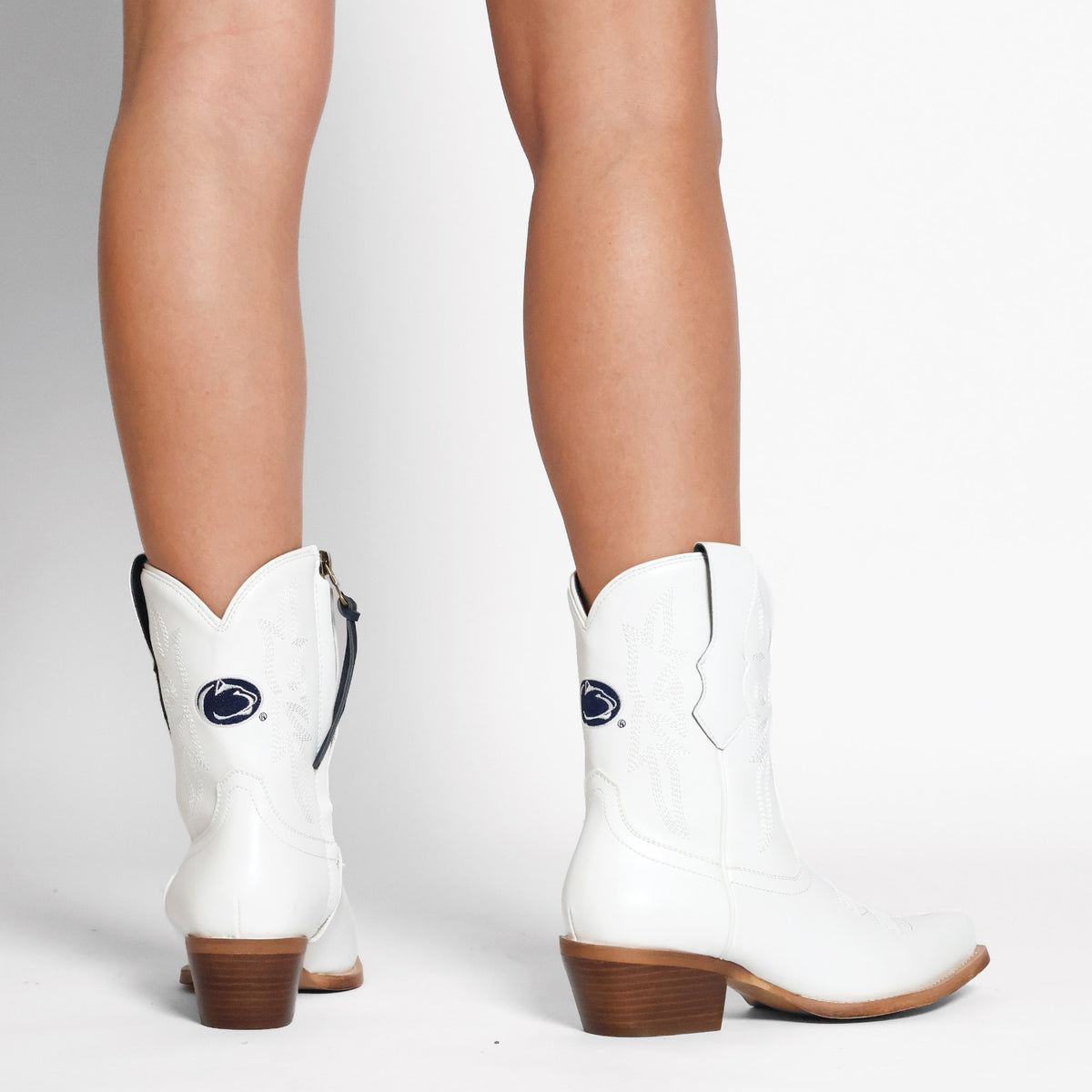 Lynn white cowboy boots with dark blue logo, side zipper and tassel pull