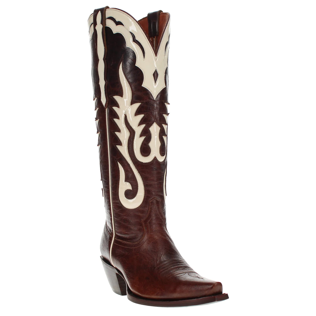 Side view of brown cowboy boot with cream ornamental stitching and low block heel