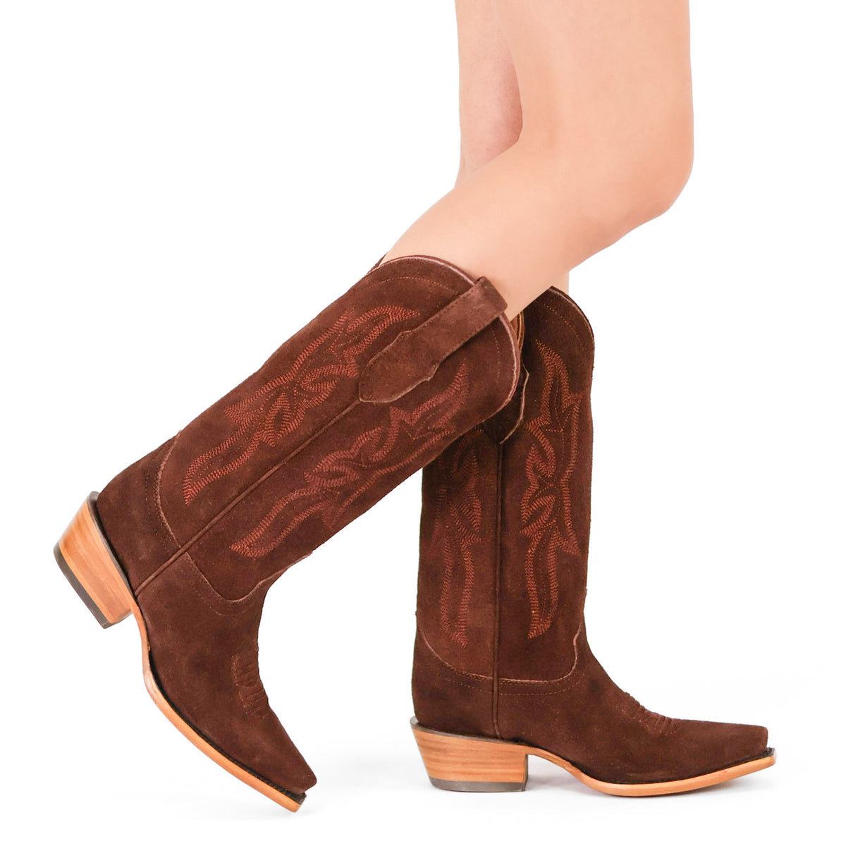 Brown suede cowboy boots with embroidered panels, side zipper opening, and low wooden heel